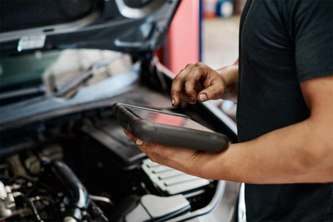 Mechanic performing a full service inspection